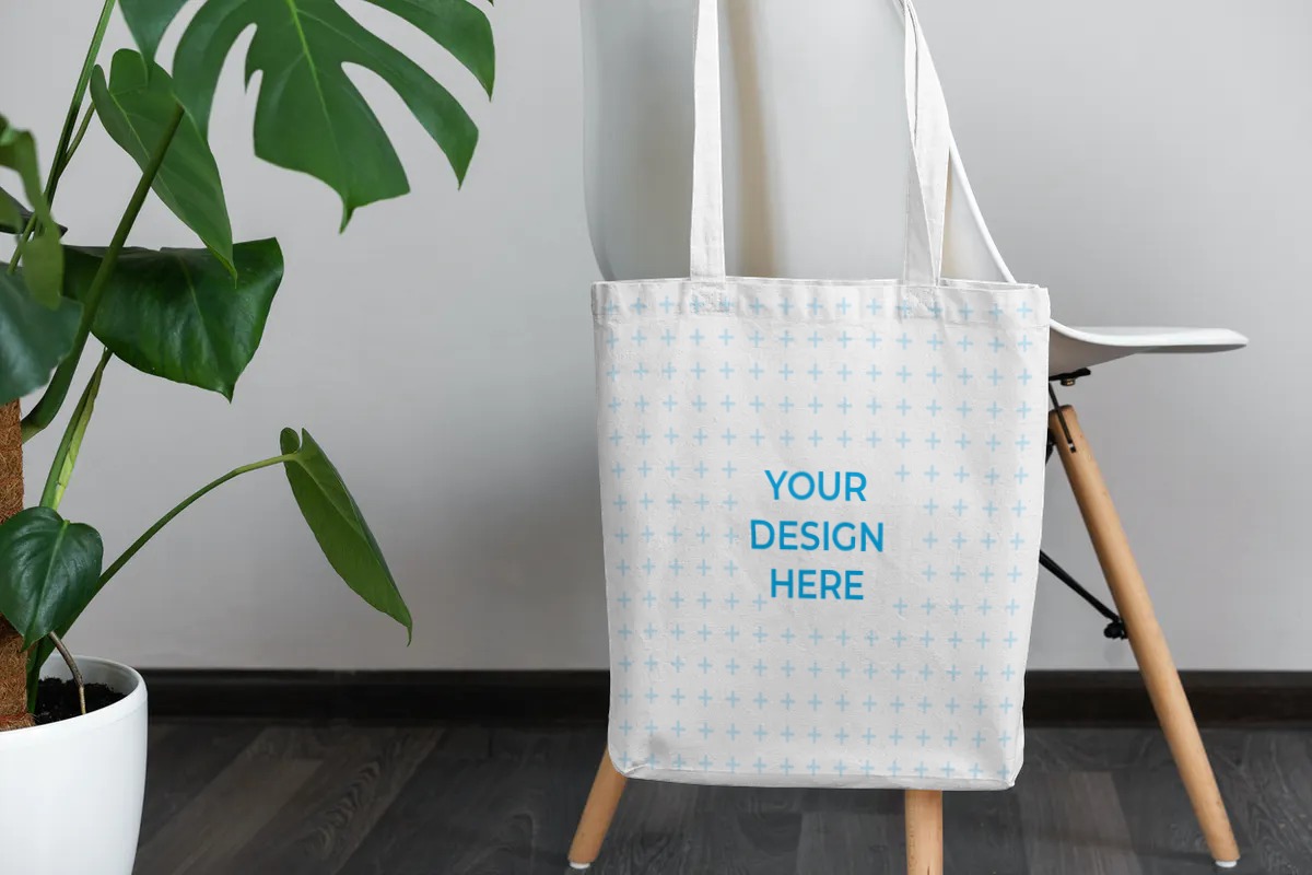 Download Free Tote bag hanging on a chair Mockup generator ...