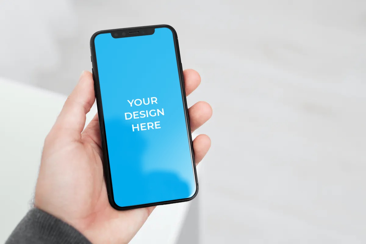 Download Free iPhone 11 Pro in the hand of a man Mockup generator ...